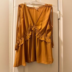 Takara sleeveless gold top. Size Large